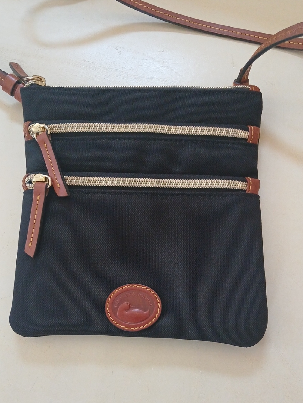 Dooney & Bourke Canvas Nylon Black Crossbody with Brown Trim and Gold Hardware - Picture 2 of 6